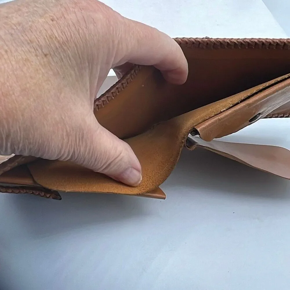Vintage Handtooled leather Men’s wallet .